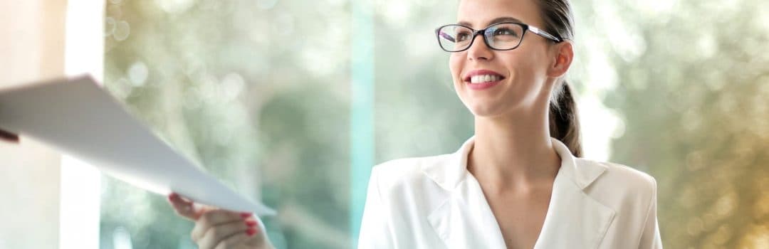 A self-employed professional reviewing paperwork